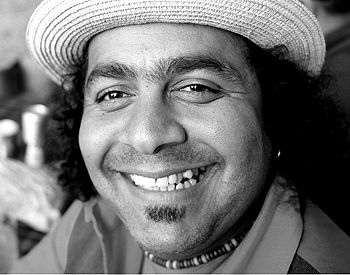 JOHN HASSAN of HASSAN'ADAS  &copy S.Gordon
